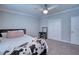 Bright bedroom with a bed, vanity, and ample closet space at 14150 Manatee Rd, Parrish, FL 34219