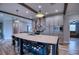 Island kitchen with seating and stainless steel appliances at 14150 Manatee Rd, Parrish, FL 34219