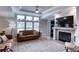 Living room with fireplace and comfortable seating at 14150 Manatee Rd, Parrish, FL 34219