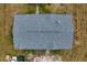 Aerial view of a house showing a gray asphalt shingle roof at 14150 Manatee Rd, Parrish, FL 34219