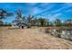 View of pond and shed near home at 14150 Manatee Rd, Parrish, FL 34219