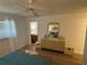 Bright bedroom with a dresser and ensuite access at 1553 Stewart Dr # 513, Sarasota, FL 34232