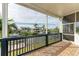 Tranquil waterfront view from the covered outdoor balcony and patio area at 1825 Bayshore Dr, Terra Ceia, FL 34250