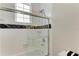 Clean bathroom with a shower/tub combo and modern fixtures at 1825 Bayshore Dr, Terra Ceia, FL 34250