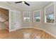 Corner bedroom with hardwood floors, natural light and bay windows at 1825 Bayshore Dr, Terra Ceia, FL 34250