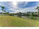 Scenic waterfront property with lush lawn and canal access at 1825 Bayshore Dr, Terra Ceia, FL 34250