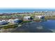 Luxury condo building with water and golf course views at 2110 Harbourside Dr # 522, Longboat Key, FL 34228