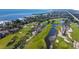 Drone view of waterfront condos near golf course at 2110 Harbourside Dr # 522, Longboat Key, FL 34228