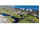 Aerial view of waterfront property with golf course at 2110 Harbourside Dr # 522, Longboat Key, FL 34228