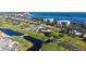 Aerial view of waterfront condo community near golf course at 2110 Harbourside Dr # 522, Longboat Key, FL 34228