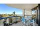 Spacious balcony with outdoor seating and stunning water views at 2110 Harbourside Dr # 522, Longboat Key, FL 34228