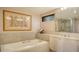 Relaxing bathroom with soaking tub and updated fixtures at 2110 Harbourside Dr # 522, Longboat Key, FL 34228