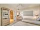 Bright guest bedroom with two twin beds and en-suite bathroom at 2110 Harbourside Dr # 522, Longboat Key, FL 34228