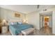 Comfortable bedroom with king-size bed and en-suite bathroom at 2110 Harbourside Dr # 522, Longboat Key, FL 34228