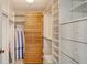 Spacious walk-in closet with ample shelving and hanging space at 2110 Harbourside Dr # 522, Longboat Key, FL 34228