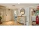 Elegant entryway featuring a painted dresser and views into other rooms at 2110 Harbourside Dr # 522, Longboat Key, FL 34228