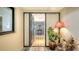Inviting entryway with a tiled floor, plants, and view of interior at 2110 Harbourside Dr # 522, Longboat Key, FL 34228