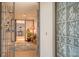 Bright and spacious entryway with decorative tile floor and access to other rooms at 2110 Harbourside Dr # 522, Longboat Key, FL 34228