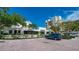 Building exterior with parking and landscaping at 2110 Harbourside Dr # 522, Longboat Key, FL 34228