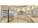 Modern kitchen featuring stainless steel appliances and ample cabinet space at 2110 Harbourside Dr # 522, Longboat Key, FL 34228