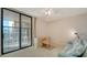 Home office with built-in desk and comfortable sofa at 2110 Harbourside Dr # 522, Longboat Key, FL 34228