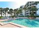 Large, refreshing pool with condo building in background at 2110 Harbourside Dr # 522, Longboat Key, FL 34228