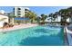Refreshing pool with plenty of lounge chairs at 2110 Harbourside Dr # 522, Longboat Key, FL 34228