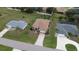 Aerial view of a neighborhood with houses and landscaping at 25067 Palisade Rd, Punta Gorda, FL 33983