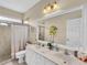 Bathroom boasts double vanity, large mirror, and shower at 25067 Palisade Rd, Punta Gorda, FL 33983