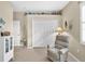 Bedroom with double closet and comfortable recliner at 25067 Palisade Rd, Punta Gorda, FL 33983