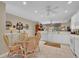 Bright kitchen with breakfast nook, and views of the Gathering room at 25067 Palisade Rd, Punta Gorda, FL 33983