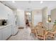 Eat-in kitchen with breakfast nook and access to the home's interior at 25067 Palisade Rd, Punta Gorda, FL 33983