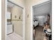 Convenient laundry room with washer, dryer, and garage access at 25067 Palisade Rd, Punta Gorda, FL 33983