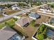 Aerial view of the property, showcasing the house and backyard at 2720 S Biscayne Dr, North Port, FL 34287