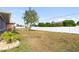 Large backyard with fenced perimeter, providing privacy and ample space at 2720 S Biscayne Dr, North Port, FL 34287