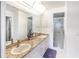 Bathroom boasts double sinks, granite countertops, and shower at 2720 S Biscayne Dr, North Port, FL 34287
