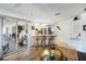 Kitchen with breakfast bar and view into Gathering room at 2720 S Biscayne Dr, North Port, FL 34287