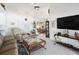 Living room with a view of the entryway and dining area at 2720 S Biscayne Dr, North Port, FL 34287