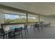 Relaxing balcony overlooking pool and nature at 304 Pine Run Dr, Osprey, FL 34229
