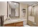 Clean bathroom, granite countertop, large shower, and updated fixtures at 304 Pine Run Dr, Osprey, FL 34229