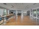 Spacious community room with hardwood floors and plenty of seating at 304 Pine Run Dr, Osprey, FL 34229