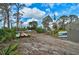 Community kayak storage area with various kayaks at 304 Pine Run Dr, Osprey, FL 34229
