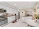 Modern kitchen with stainless steel appliances and granite countertops at 304 Pine Run Dr, Osprey, FL 34229