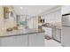 Modern kitchen with stainless steel appliances and granite countertops at 304 Pine Run Dr, Osprey, FL 34229