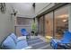 Relaxing patio with seating area, plants, and access to interior at 304 Pine Run Dr, Osprey, FL 34229