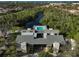 Community pool and clubhouse aerial view at 304 Pine Run Dr, Osprey, FL 34229