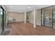 Sunroom with multiple sliding glass doors, offering abundant natural light at 304 Pine Run Dr, Osprey, FL 34229