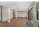 Spacious sunroom featuring wood-look floors and access to outdoor patio at 304 Pine Run Dr, Osprey, FL 34229