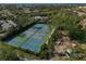 Aerial view of tennis and pickleball courts at 304 Pine Run Dr, Osprey, FL 34229