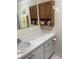 Bathroom with vanity, medicine cabinet, and tiled floor at 305 47Th Avenue W Dr # 143, Bradenton, FL 34207